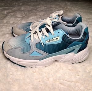 Blue and white Adidas shoes